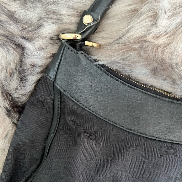 Gucci black canvas monogram hobo bag with gold buckle. Comes with a duster bag. - Picture 3 of 12